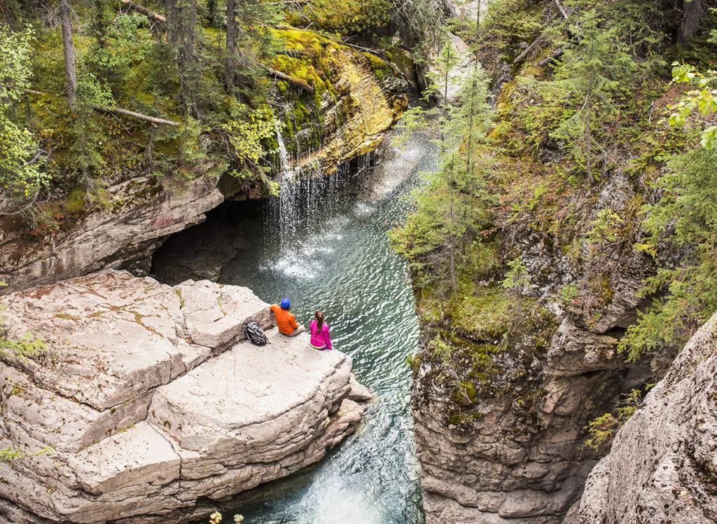 Hike Maligne Canyon: Your clients they will pass waterfalls, fossils, wildlife and underground streams along the easy trail that crosses a series of bridges across the gorge.