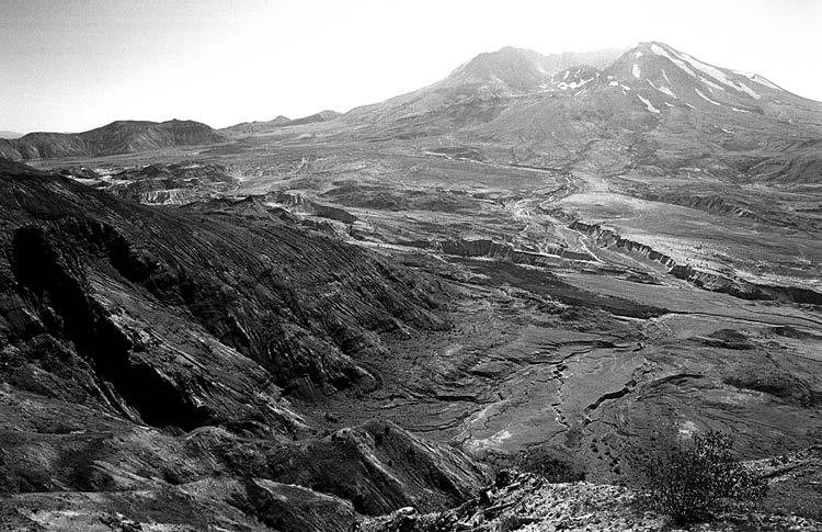 issue 60 - page 4 Looking south toward Mount St. Helens from the Johnston Ridge Observatory. From this angle you can see the 1000 tall lava dome inside the open crater.