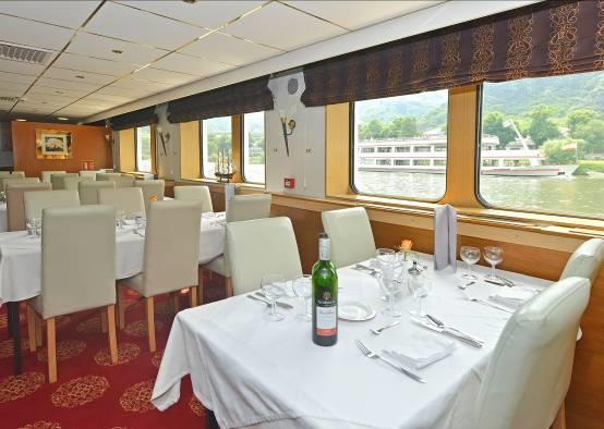 site) The cruise ship MS NORMANDIE: On the upper deck you will find the comfy panorama salon with its bar and the small sauna (advance booking at the reception only)