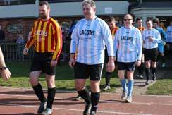 Both politicians and journalists took on a team of firefighters at a charity football match, organised by Brandon, to raise funds for the Norfolk Flood Appeal.