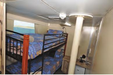 our choices of teas, chais or Class 6: Exterior King single bunk beds with shared facilities, large viewing windows, DVD players, air conditioning, storage cabinet