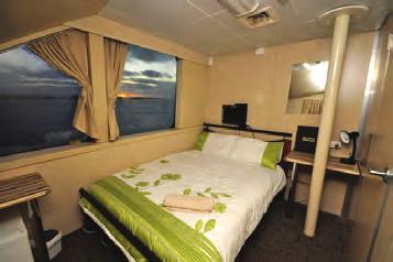 Class 2: Interior doubles with ensuites, personal DVD players, air conditioning, storage cabinet and bar fridge. Cabins are on the main deck. Cabins 4,5, 7, 8.
