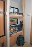 TV & VCR not included. The 350 lb. weight rated bunks provide a reading light, and privacy curtain.