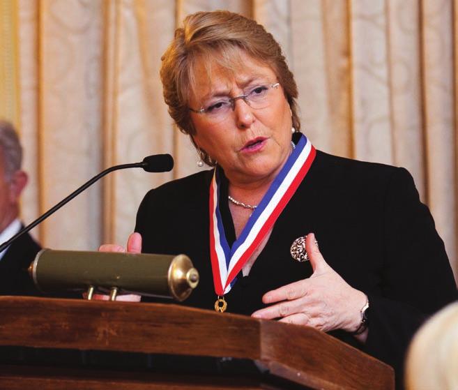 Bachelet with the Gold Insigne, the organization s highest honor.