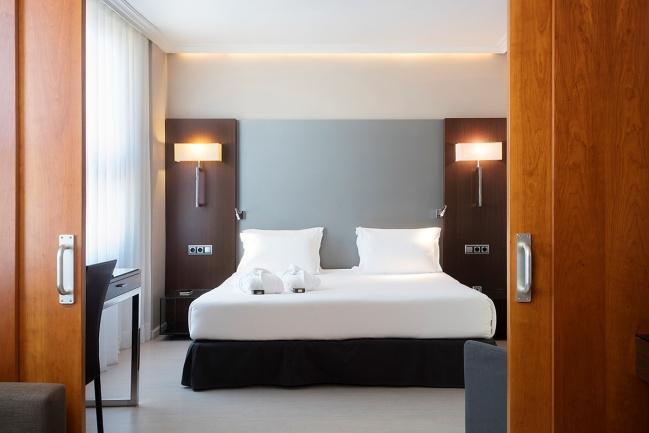 Suite: spacious room with a bedroom area, separate living room and dressing room.