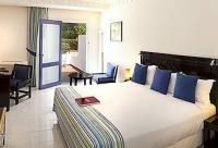 Each spacious hotel guest room has a private balcony or a terrace with views over the gardens or pools and come equipped with