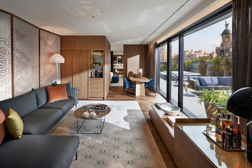 UNLOCK THE CITY FROM YOUR SUITE Luxurious designer rooms with views of Gaudi s