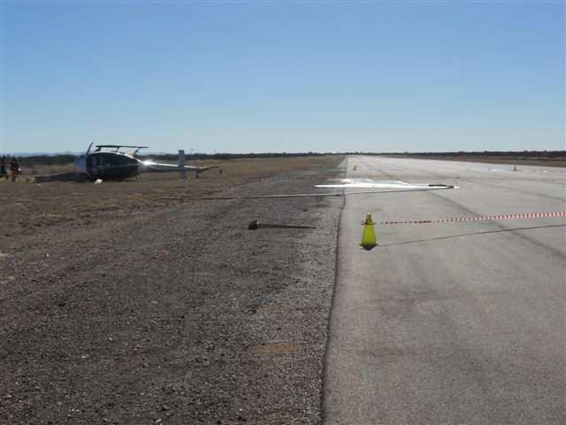 1.12 Wreckage and Impact Information 1.12.1 Final impact point The final impact point was to the left of Runway 35 at Sishen Aerodrome The helicopter came to rest facing in south-westerly direction, determined to be 240 Magnetic.