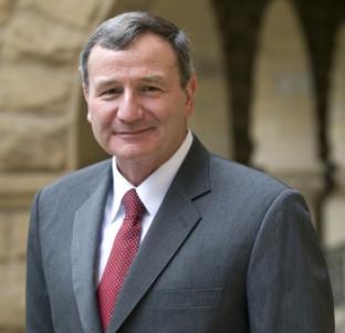 Faculty Leader Karl Eikenberry, MA 94, is the William J.