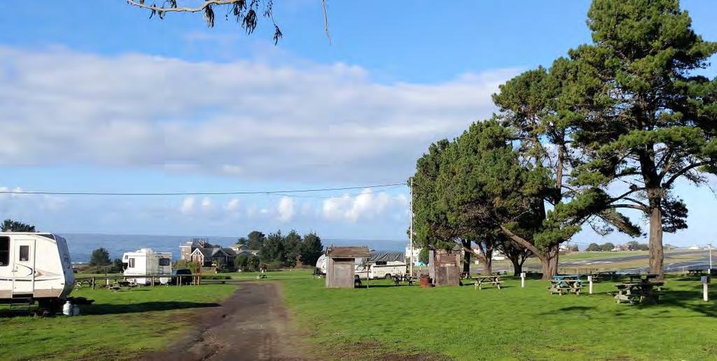 Lighthouse in background is Historic Cape Mendocino Lighthouse, shipped and reassembled at Mal Coombs park.