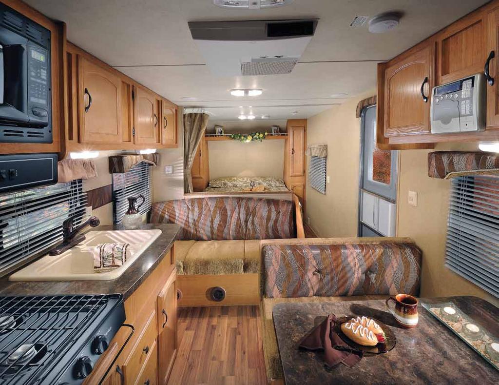 The Wildwood X-Lite Series offers you both traditional travel trailer and fifth wheel layouts and convenient expandable floorplans.