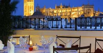 00 Featuring a beautiful Andalusian courtyard and a roof terrace looking onto La Giralda, Vincci la Rabida is