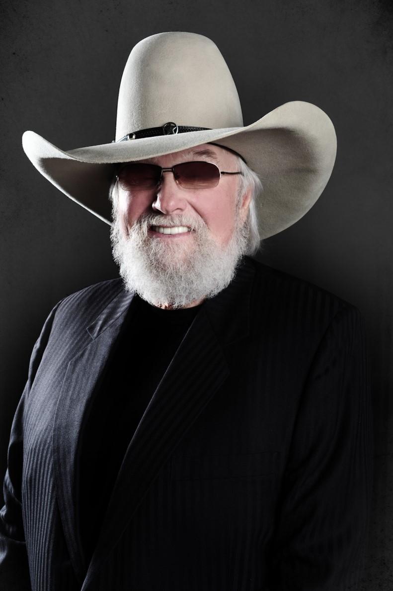 PAGE 2 VOLUME 1, ISSUE 1 Artist Interview with Charlie Daniels Introduction: Charles Edward Daniels (born October 28, 1936) is an American multiinstrumentalist, lyricist, and singer, known for his