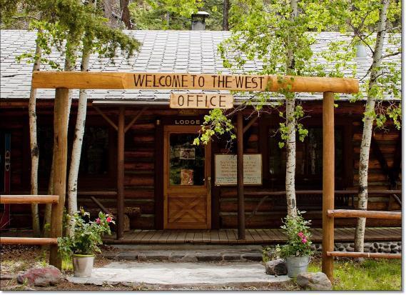 The Absaroka Mountain Lodge offering includes the main lodge, owner residence, 15 guest cabins, employee bunkhouses, barn, corrals, well house, bridges, and