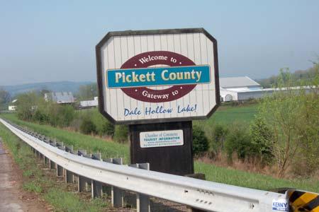 Turn right (west) into Pickett County Welcome sign