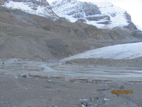 In the second picture taken at the top of the hill, you can see that it is still a significant way to the glacier which is partially hidden about as far