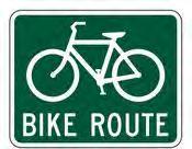 The standard pavement marking symbol for bike lanes is a bicycle and a directional arrow (MMUTCD, 2005).