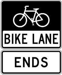 bicyclists of specific traffic laws and regulations such as Bike Lane Ends; and Directional and way finding signs, which direct bicyclists to desired places and destinations; they may be placed along