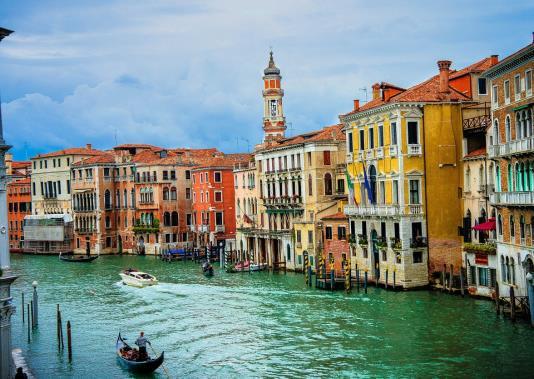 Adriatic Sea. It has no roads, just canals including the Grand Canal thoroughfare lined with Renaissance and Gothic palaces. The central square, Piazza San Marco, contains St.