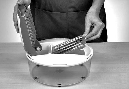 If you want to cut large items of food standing on end, hold them on the cutting insert and then press down gently with the cutting stamp so that they can t slip.
