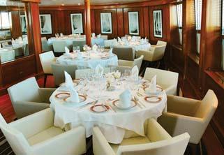 Each of the 32 ocean-view Staterooms features a window or porthole, private bathroom with shower, one fixed queen bed or one queen bed convertible into two twin beds,