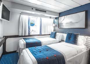 Each of the 32 ocean-view Staterooms features a window or porthole, private bathroom with shower, one fixed queen bed or one queen bed convertible into two twin beds, individual climate control,