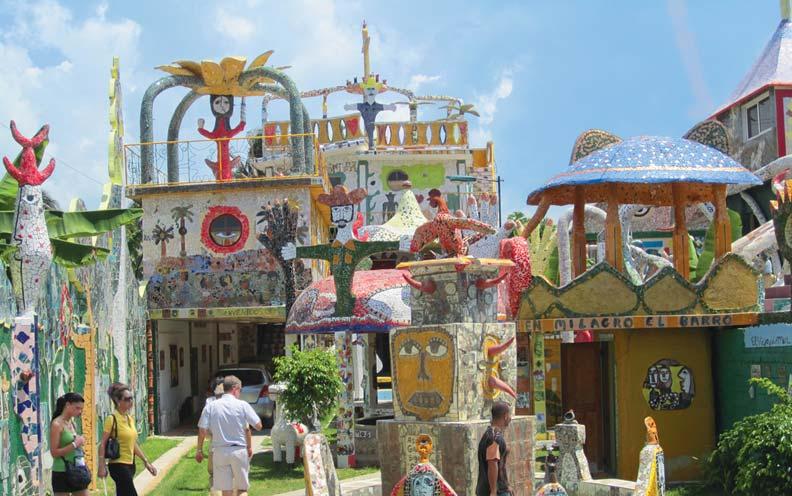 Inspired by Picasso and Gaudí, Cuban painter and sculptor José Rodríguez Fuster transformed his house and others in his Havana neighborhood, Jaimanitas, with kaleidoscopic sculptures and mosaics.