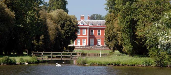 Fawley Court (Left) Fawley Court seen from the River Thames at Remenham (Below) Stained glass from Fawley Court c1654 now in Fawley church The house and former deer park surrounding it was