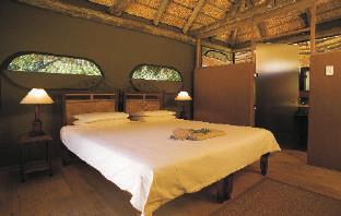 Lodge comprises tranquil thatched wooden lodges on stilts with magnificent views. Each lodge has 3 or 4 en-suite bedrooms with an African ethnic theme.