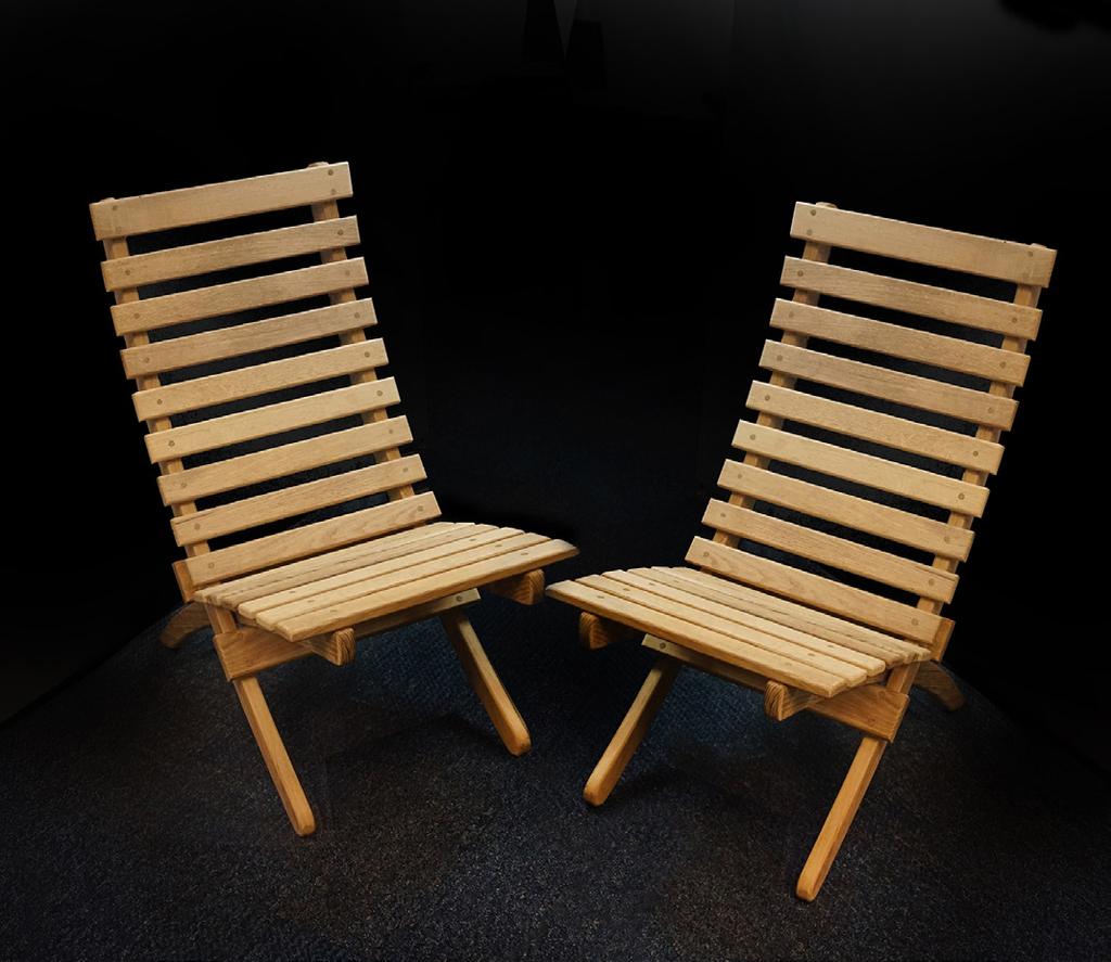 Two Handcrafted Chairs Relax and enjoy your own back yard with these beautiful poplar and oak chairs handcrafted by local resident Tony Schantz.