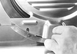 ALWAYS turn slicer off and unplug power cord BEFORE cleaning. 7. To clean the knife ring guard, soak a clean cloth in a mild detergent and warm water solution. Ring out excess water from cloth.
