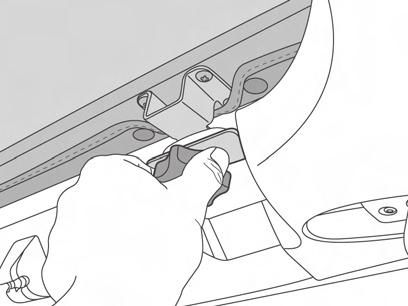 Place the tabs on the Knob Bases above the footman loops in the windshield frame.