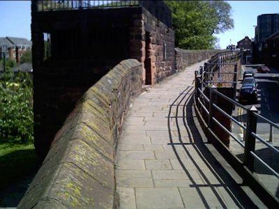 Copyright by GPSmyCity.com - Page 6 - G) Chester City Walls (must see) Chester city walls consist of a defensive structure built to protect the city of Chester.