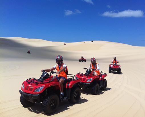 SAND DUNE ADVENTURES ABORIGINAL OWNED Ride from bush to beach on the magnificent Worimi Sand Dunes on Stockton Beach.