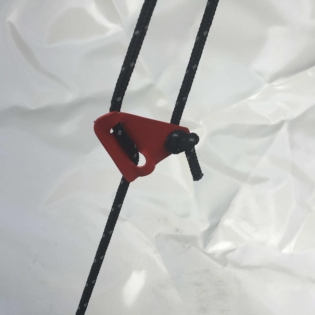 - Tensioning with hard-wood red guy runners, or preferably metallic red guy runners, as per the photos below, pre-mounted on the ropes.