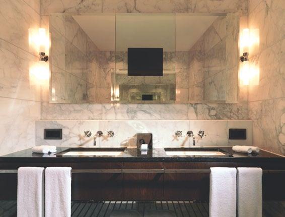 The light, luxurious marble bathrooms have whirlpool tubs and separate showers.