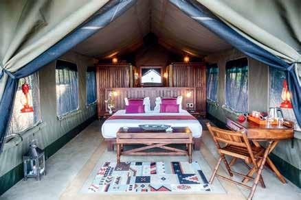 The eleven luxury lodge tents are sited on the hillside for a stunning view of the green valley.