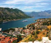 Dock in Montenegro s stunning Bay of Kotor, a natural harbor and Europe s southernmost fjord.
