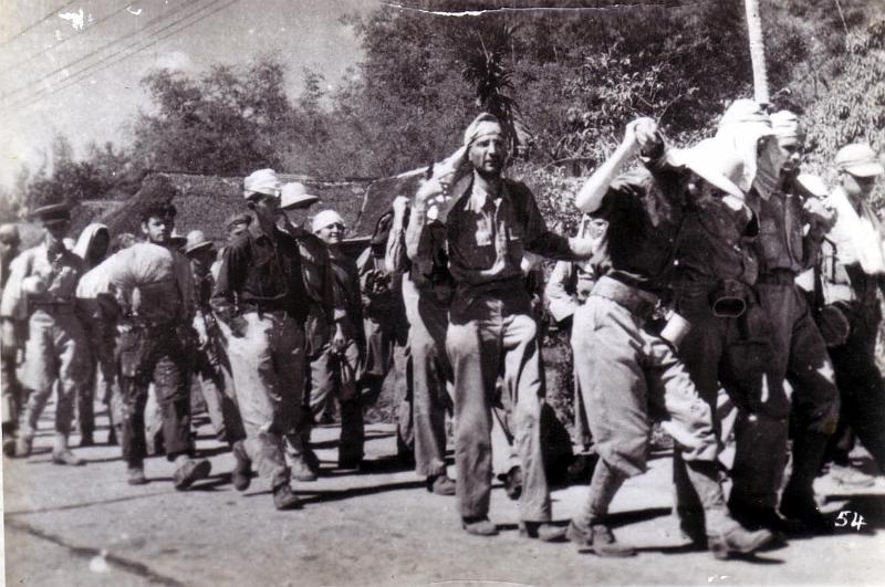 WWII in the Pacific: Bataan Death March Japanese split POWs into groups of 500-1000 Force marched them to a RR station 60 miles away Boarded a train that took them 8 miles away from the POW camp they