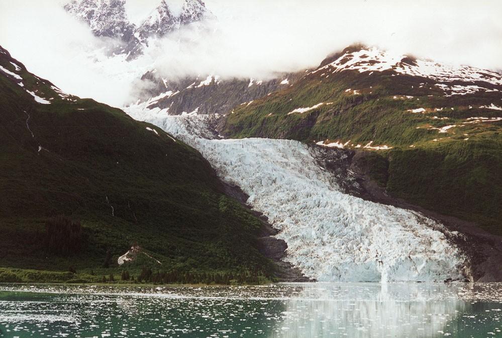 Introduction Glaciers are masses of ice which move over land by plastic flow and basal slip.