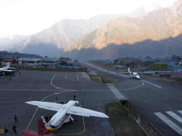 Lukla airstrip Ann Foulkes, trekmountains Day 2 Young pilgrim, Kathmandu Ann Foulkes, trekmountains Fly Kathmandu to Lukla, trek to Phakding 3 hours trekking An early start is required for the short,