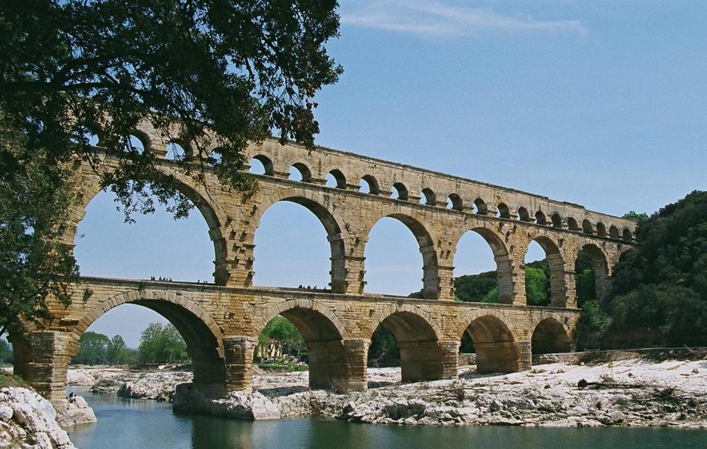 Pont du Gard, Nimes, France The Pont du Gard is a spectacular well-preserved three tiered Roman aqueduct built over the River Gard.