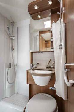1 Comfortable compact bathroom with separate shower cabin. 2 Sliding washbasin with tap.