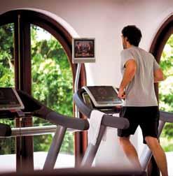 Fitness Pavilion Featuring cutting-edge cardio and weight-training equipment, treadmills, Stairmasters, recumbent bikes, elliptical cross trainer, circuit machines by Cybex and dumbbells.
