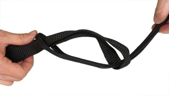 knot using the Velcro strip on the harness s 