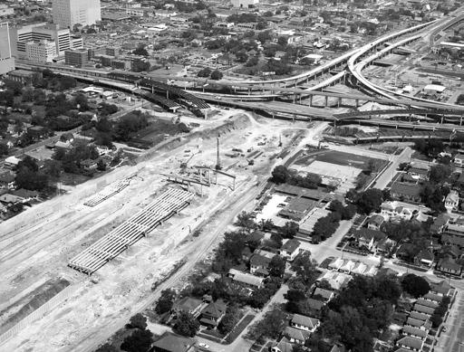 136 Houston Freeways US 59 construction: This view shows construction of the interchange at US 59 and IH 45 in April 1972. The IH 45 main lanes had previously opened in 1967.