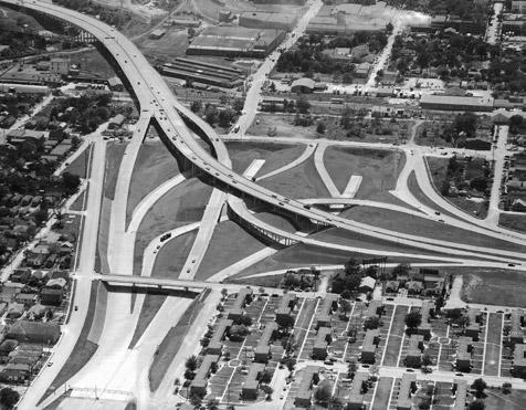 124 Houston Freeways Aiming for the downtown crossing: This view shows the terminus of the East Freeway (IH 10) at US 59 in May 1961.