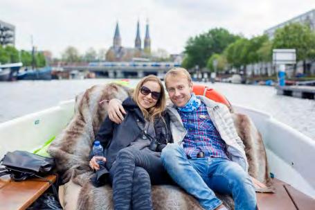 Amsterdam The Netherlands Family Fun Infosheet activities Private Canal Cruise - Amsterdam Enjoy a cold drink while cruising relaxed along