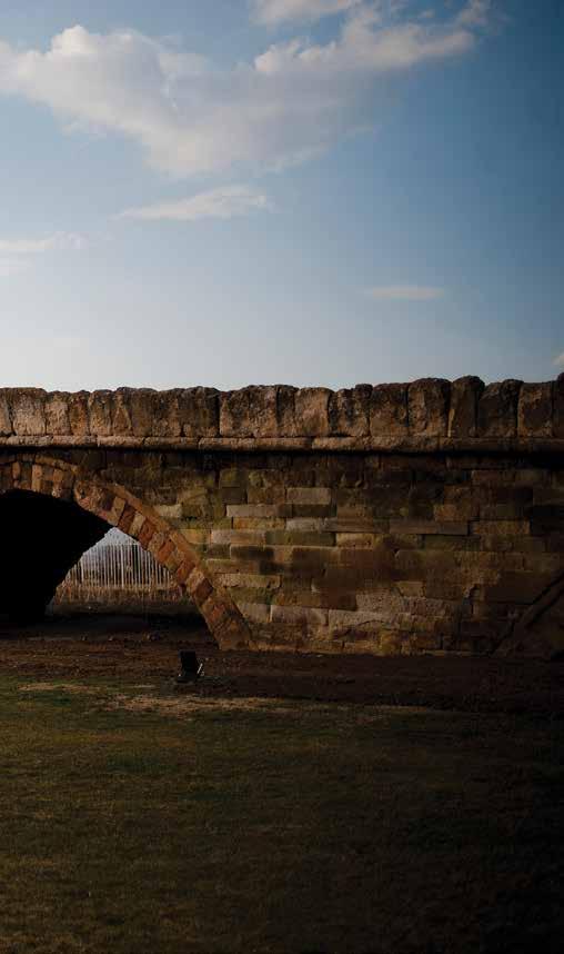 STORIES OLD AND NEW OF A COUNTRY THRIVING The Old Stone Bridge with nine arches is