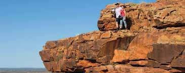 Through red earth and rugged terrain, the lands beyond Alice Springs await. Marvel at the dramatic chasms and gorges of the MacDonnell Ranges.